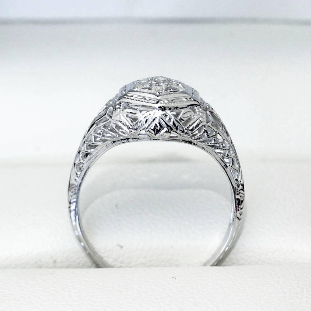 Art Deco Seven Diamond White Gold Cluster Engagement Ring For Sale 1