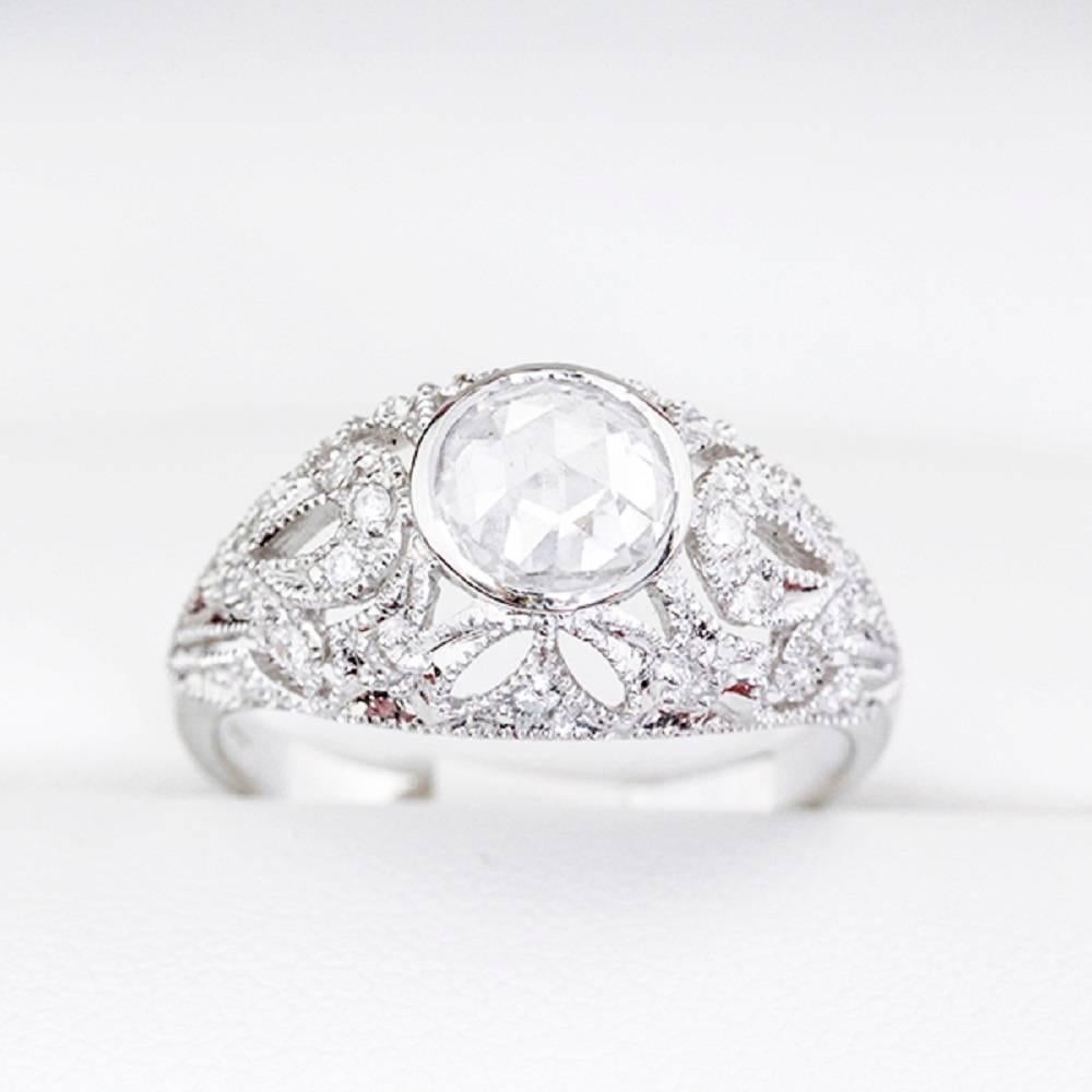 Divine old rose cut Diamond, featured in stunning NEW ring setting

The story of this ring:  We purchased a lovely old Georgian Engagement ring only to find that the setting was too far gone to restore.  Not uncommon in this industry.  However, the