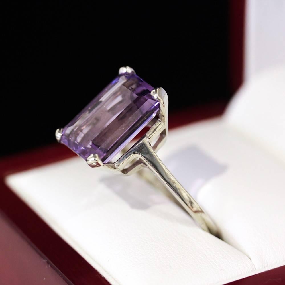 Modernist 10 Carat Emerald Cut Amethyst Gold Cocktail Ring For Sale