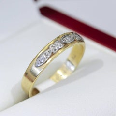 Antique 18 Carat Gold Wedding Band with Raised Scrolling Design, circa 1930