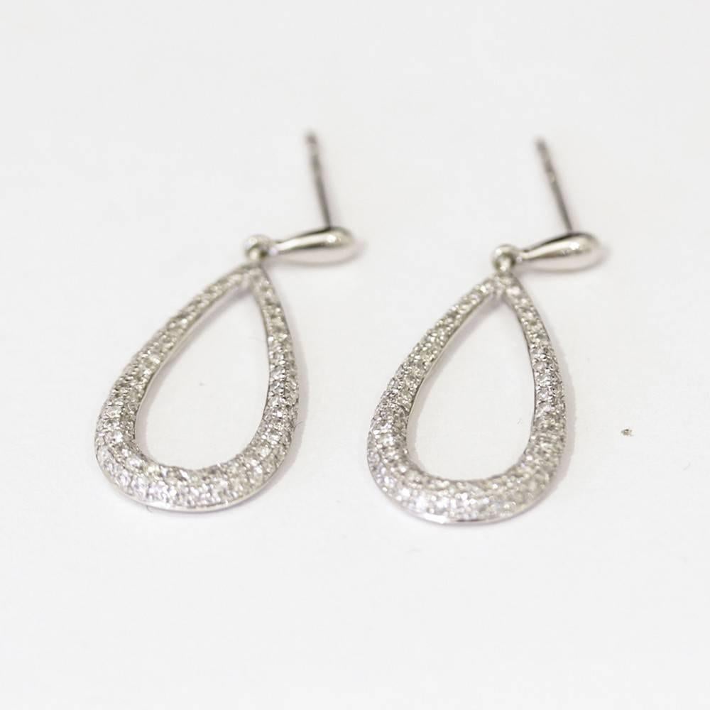 Stunning! New Pave set Diamond oval drop hoop Earrings.  

Diamond drop hoop earrings, set in 14ct white gold.  New Retired Effy Pave Classica collection.  These sold out and are the last set we have found anywhere. 

Metal: 14K Gold White
Stone: