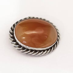 1940s Oval Agate Cabochon Set into a Sterling Silver Roped Shaped Bezel Brooch