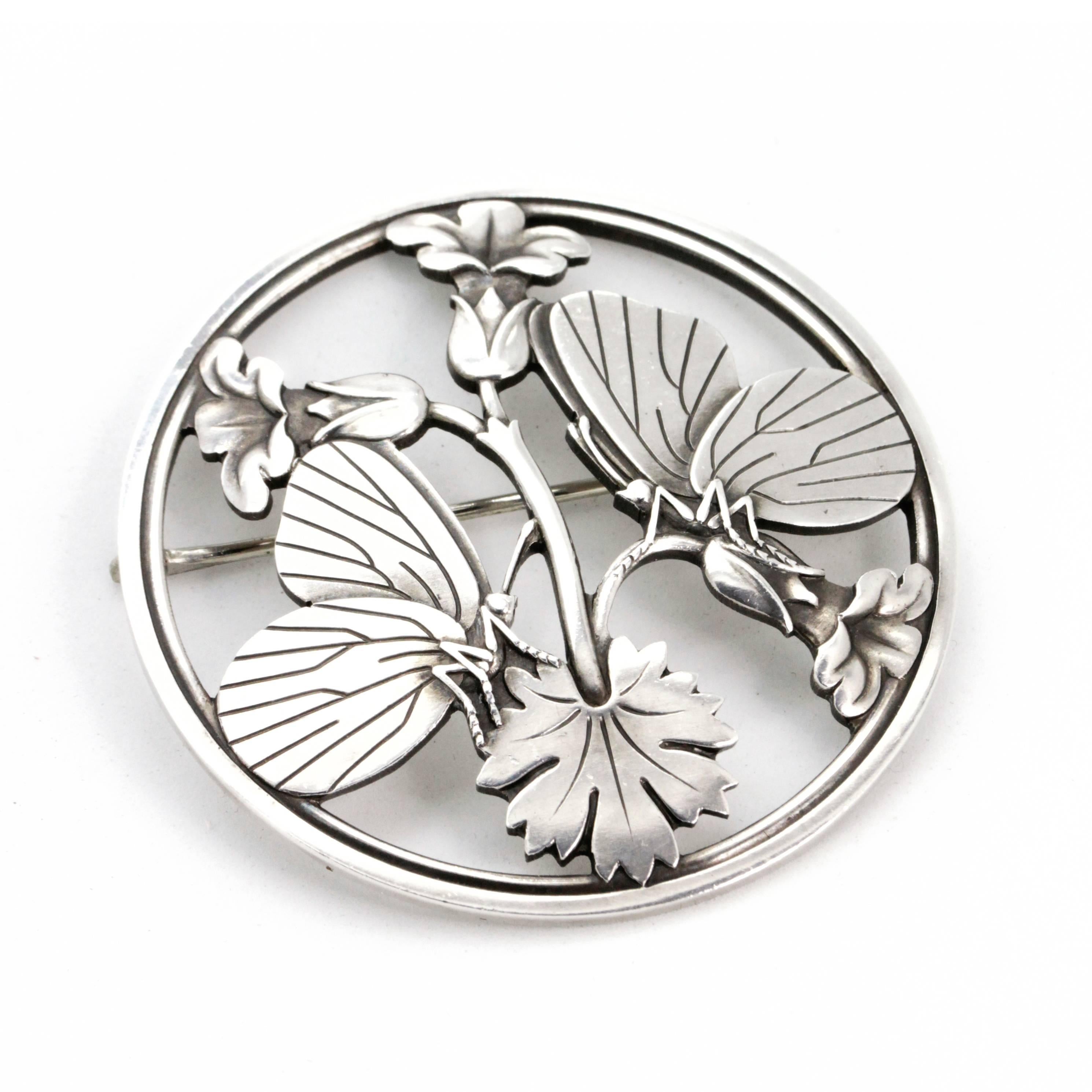 Vintage Georg Jensen Moonlight Blossom Brooch

Large, mid century, vintage Georg Jensen Sterling Moonlight Blossom brooch. Design number 283, Designed by Arno Malinowski for Georg Jensen. Arno Malinowski used themes from nature, creating absolutely