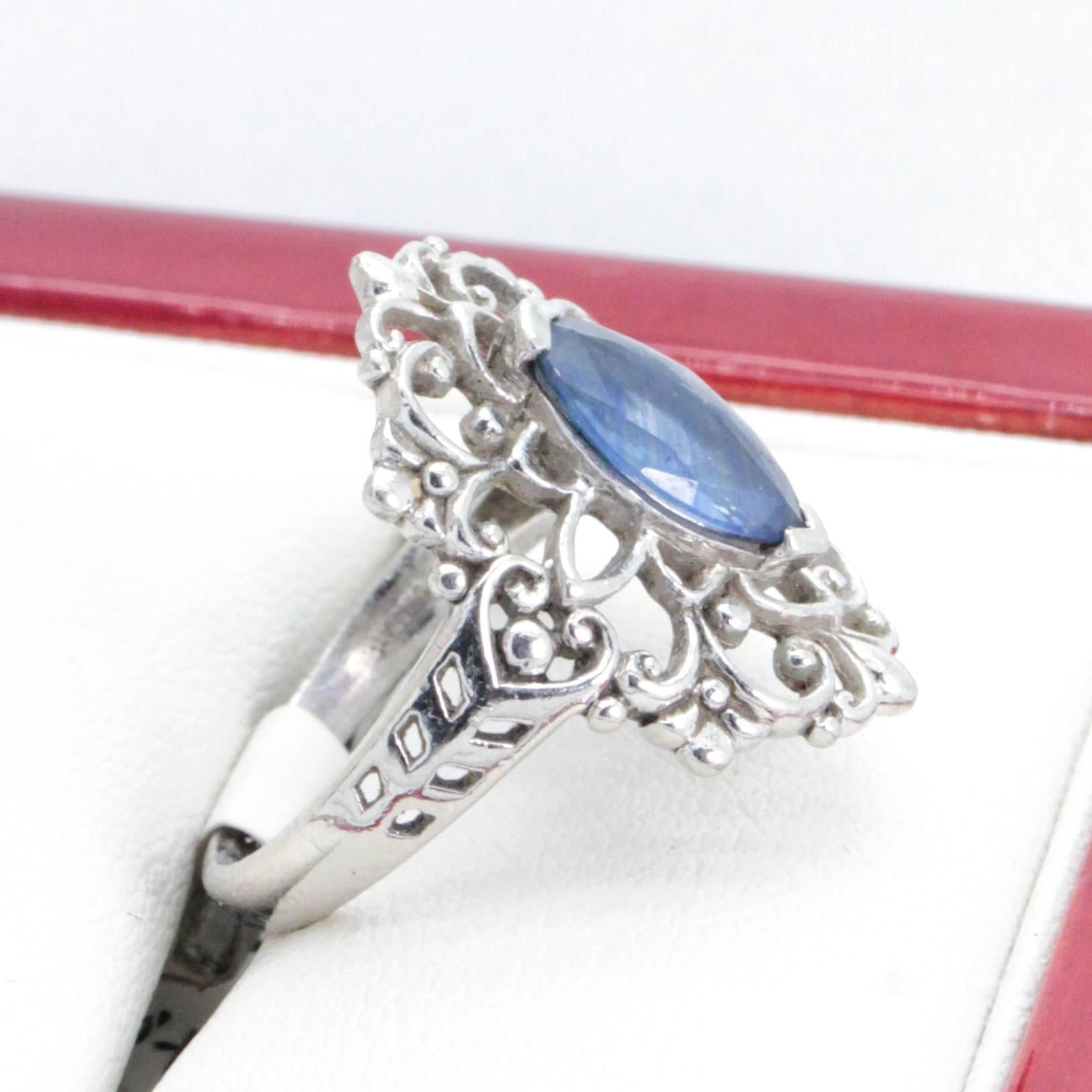 Women's Platinum Vintage Marquise-Cut Sapphire and Filigree Ring For Sale