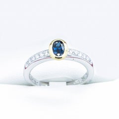 Substantial Sapphire and VS1 G Diamond two tone 18kt Gold Engagement Ring