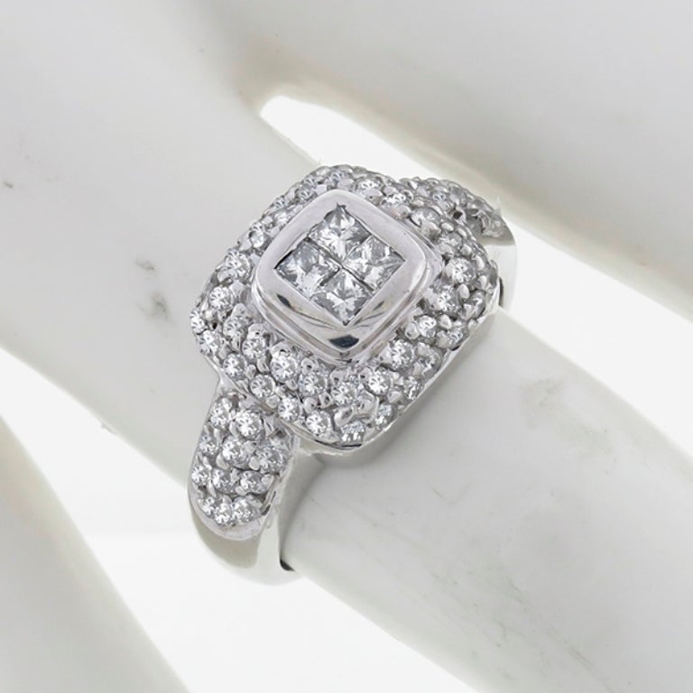 Made of 18k white gold, these earrings and ring set center sparkling princess cut diamonds accentuated by round cut diamonds weighing approximately 2.25ct. 

The ring is size 7 1/4, and can be resized. 

Inventory #43991PASS