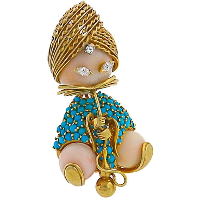 Made of 18k yellow gold, this pin features a hookah smoker which is set with angel coral head and legs adorned with sparkling round and marquise cut diamonds weighing approximately 0.15ct. The body is adorned with gorgeous cabochon cut