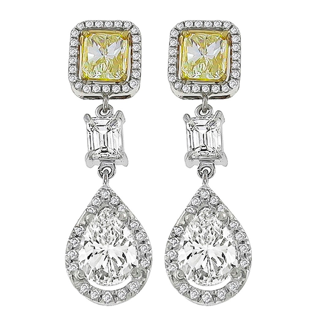 Natural Fancy Diamond GIA Certified 3.43 Carat Pear Shaped Diamond Gold Earrings