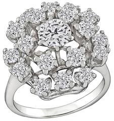 Charmante bague grappe en or blanc et diamants