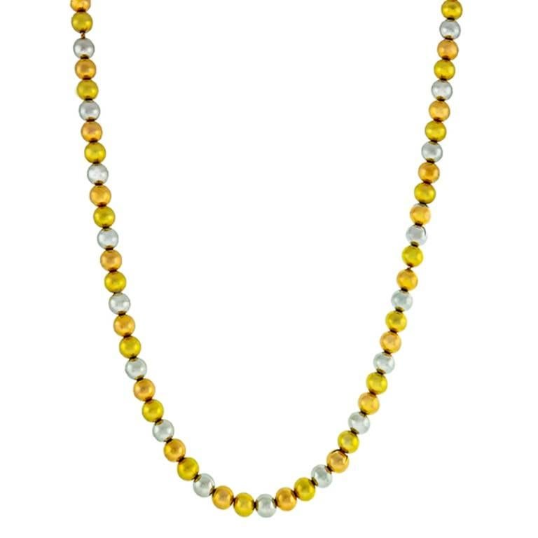 Made of 18k yellow, rose and white gold beads, this necklace features a smooth gold finish. The necklace measures 16 3/4 inches in length and weighs 37.6 grams. It is stamped 750.

Inventory #53748PABS