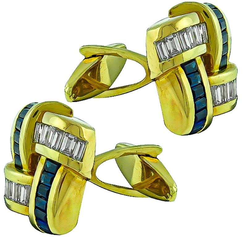 Made of 18K yellow gold, these cufflinks are set with sparkling baguette cut diamonds weighing approximately 1.40ct graded F color with VS1 clarity and baguette cut sapphires weighing approximately 1.70ct.

The cufflinks are stamped KRYPELL 18K