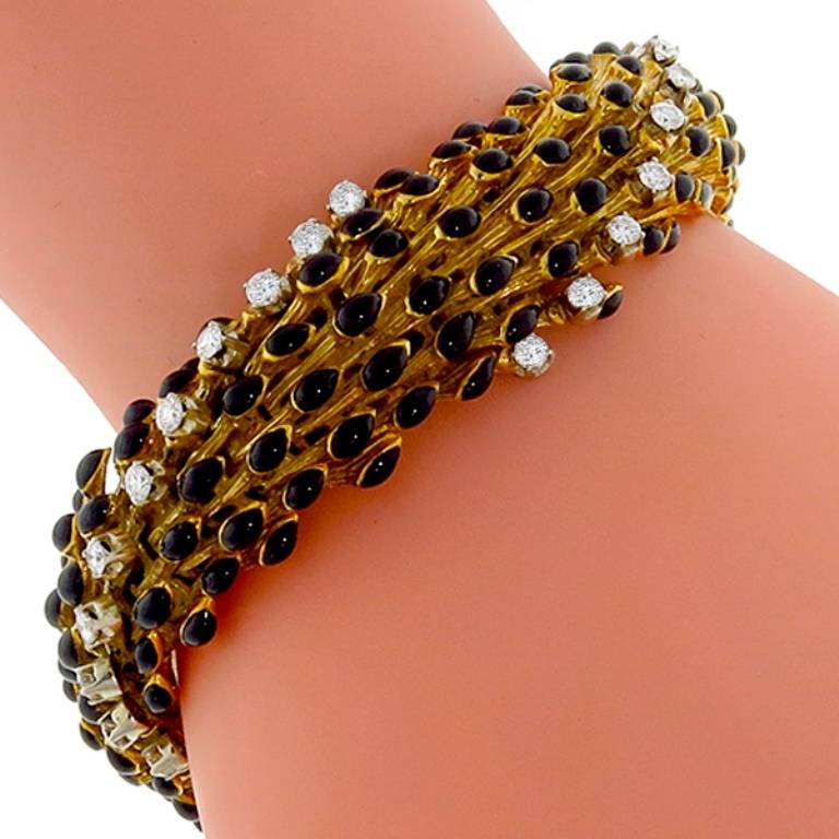 Made of 18k yellow and white gold, this bracelet is set with sparkling round cut diamonds weighing approximately 2 carat. The color of these diamonds is H with VS clarity.

Inventory #6429WNSS
