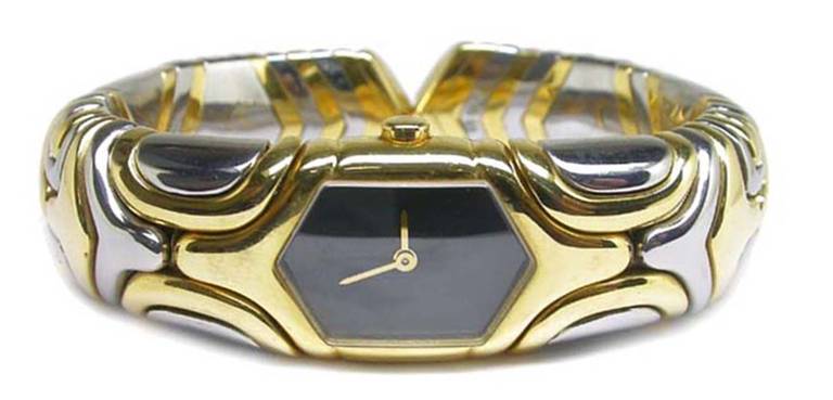 Bulgari Lady's Yellow Gold and Stainless Steel Oretacier Bangle Watch circa 1995 In Excellent Condition In New York, NY