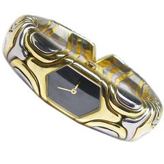 Bulgari Lady's Yellow Gold and Stainless Steel Oretacier Bangle Watch circa 1995 5