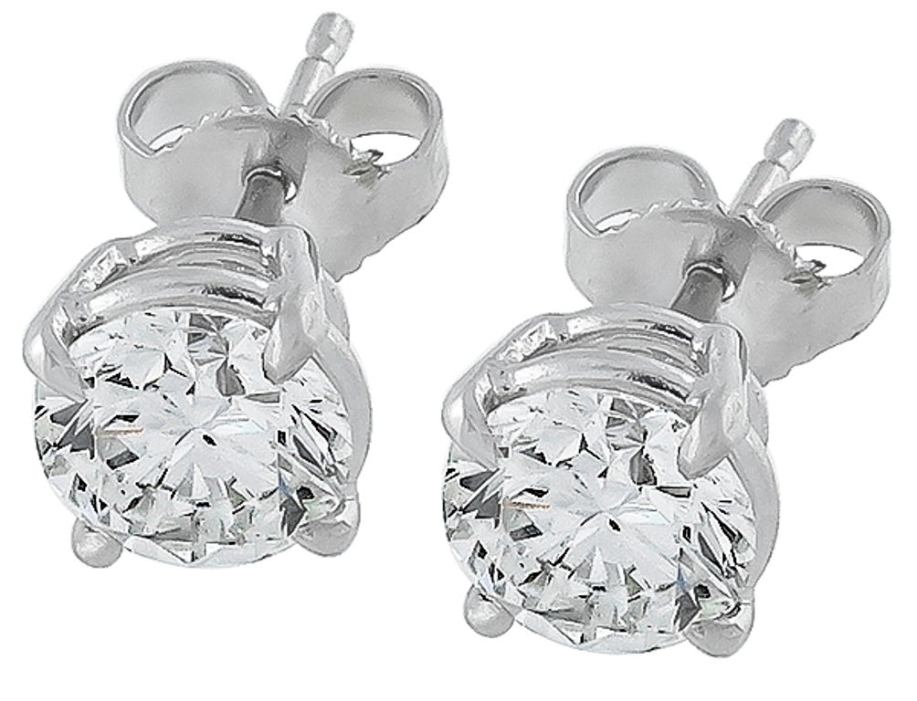 This stunning pair of 14k white gold earrings feature sparkling GIA certified round brilliant cut diamonds that weigh 0.71ct and 0.72ct. The color of the two diamonds are H and the clarity is VS1 and VVS2.

Inventory #21370AEOS