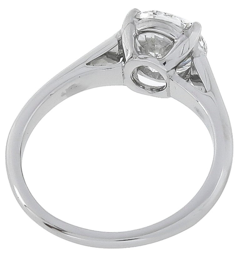 This platinum ring centers a GIA certified round brilliant cut diamond that weighs 2 carats and is graded G color with VS2 clarity.
The size of the ring is 6 3/4, and can be resized.

Inventory #47062POESS
