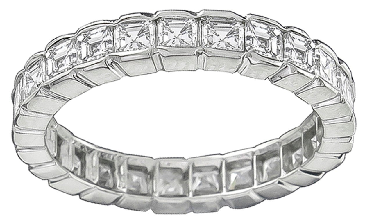 Made of platinum, this wedding band features sparkling Asscher cut diamonds weighing approximately 2.50 carat. The diamonds are graded F-G color with VS1 clarity.
The band is size 6 1/2.

Inventory #13810ASSS