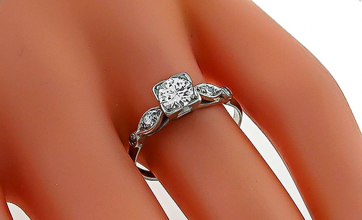 Women's Charming Round Cut Diamond Platinum Engagement Ring For Sale