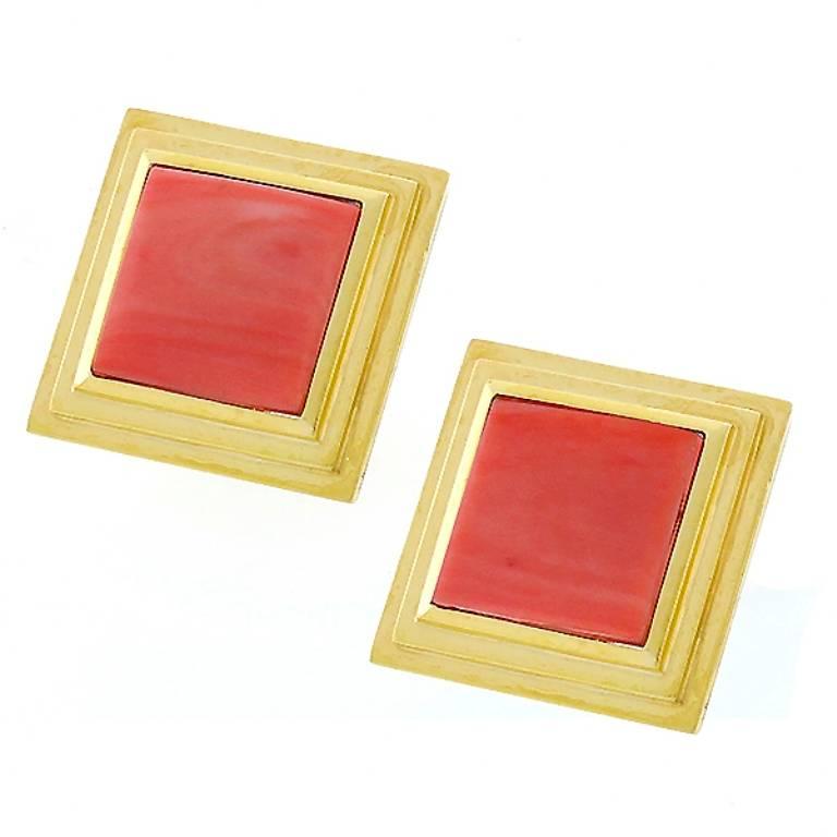 This elegant 18k yellow gold earrings feature square cut coral at the center. 
The earrings measure 26.5mm by 26.5mm and weigh 32.7 grams.

Inventory #18905PABS
