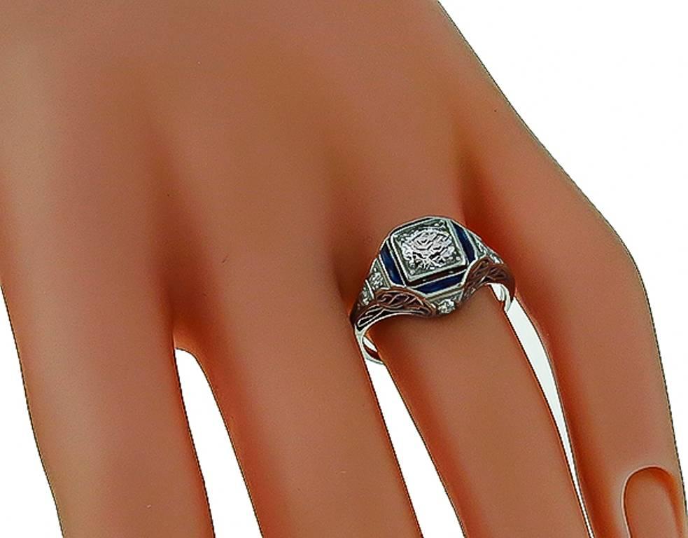 Art Deco Enticing 0.70 Carat Diamond Sapphire Platinum Engagement Ring For Sale
