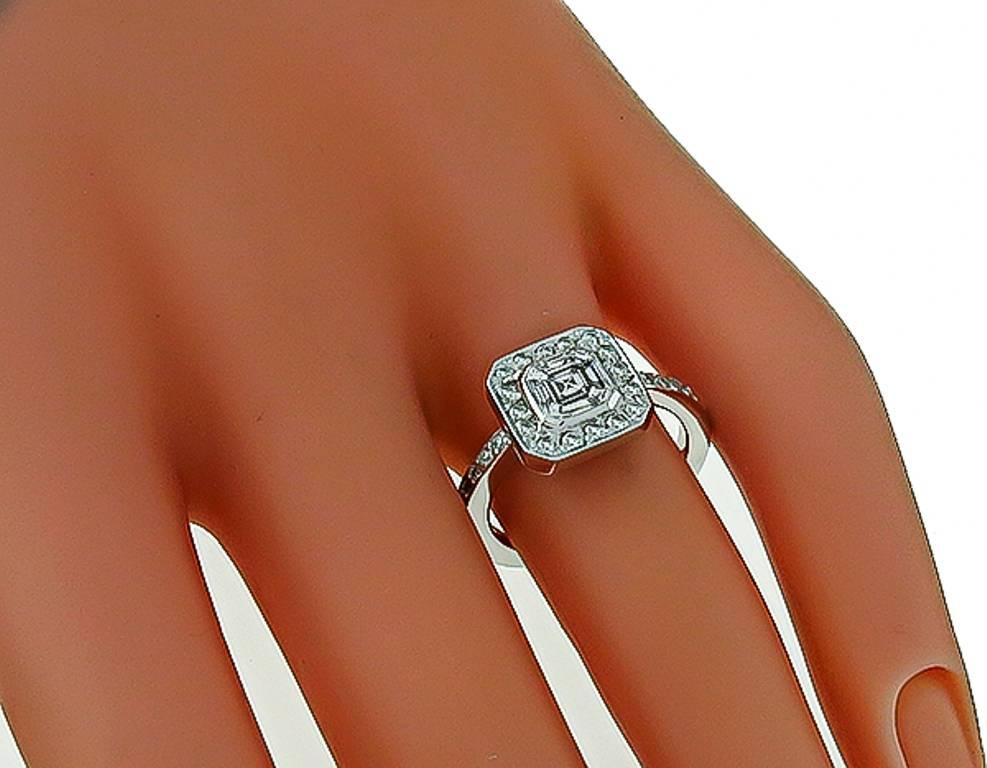 2 carat asscher cut diamond on finger