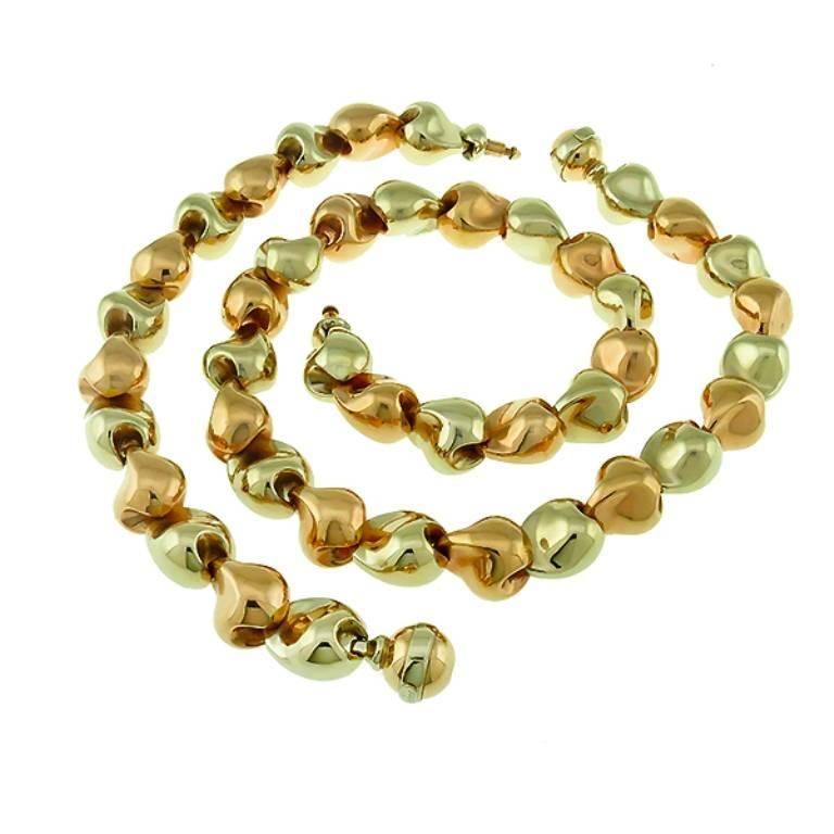 This gorgeous 2 tone 18k yellow & white gold set features a gold nugget bead motif. The bracelet measures 8 inches in length and the necklace measures 17 inches. 
The set is stamped 18k and weighs 105.8 grams.

Inventory #27520WOSS