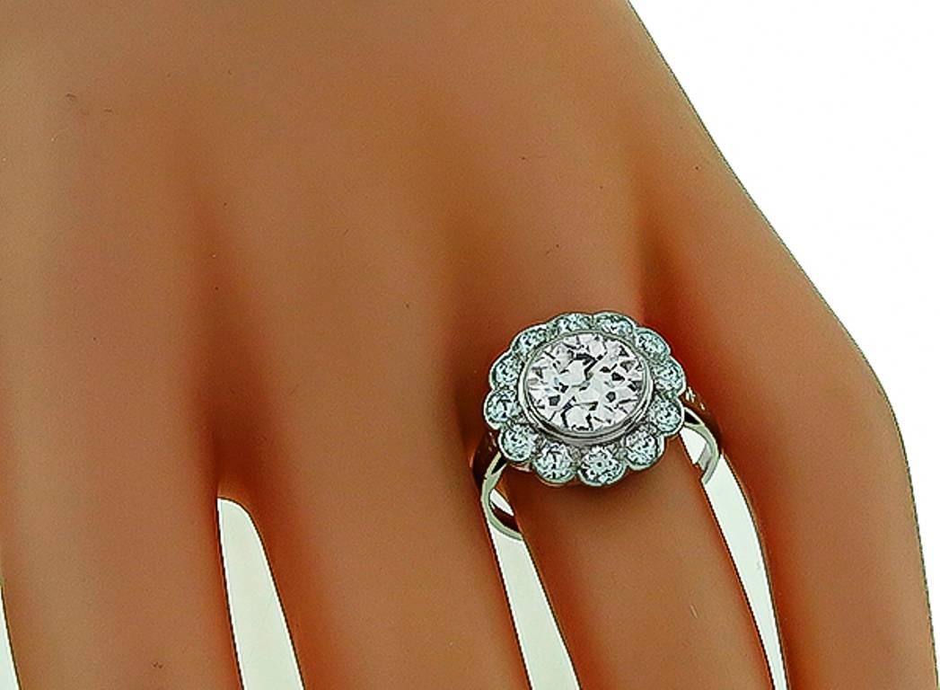 This stunning 14k white gold engagement ring from the Art Deco era, is centered with a sparkling GIA certified old European cut diamond that weighs 2.24ct. graded K color with SI1 clarity. Accentuating the center stone are high quality old mine cut