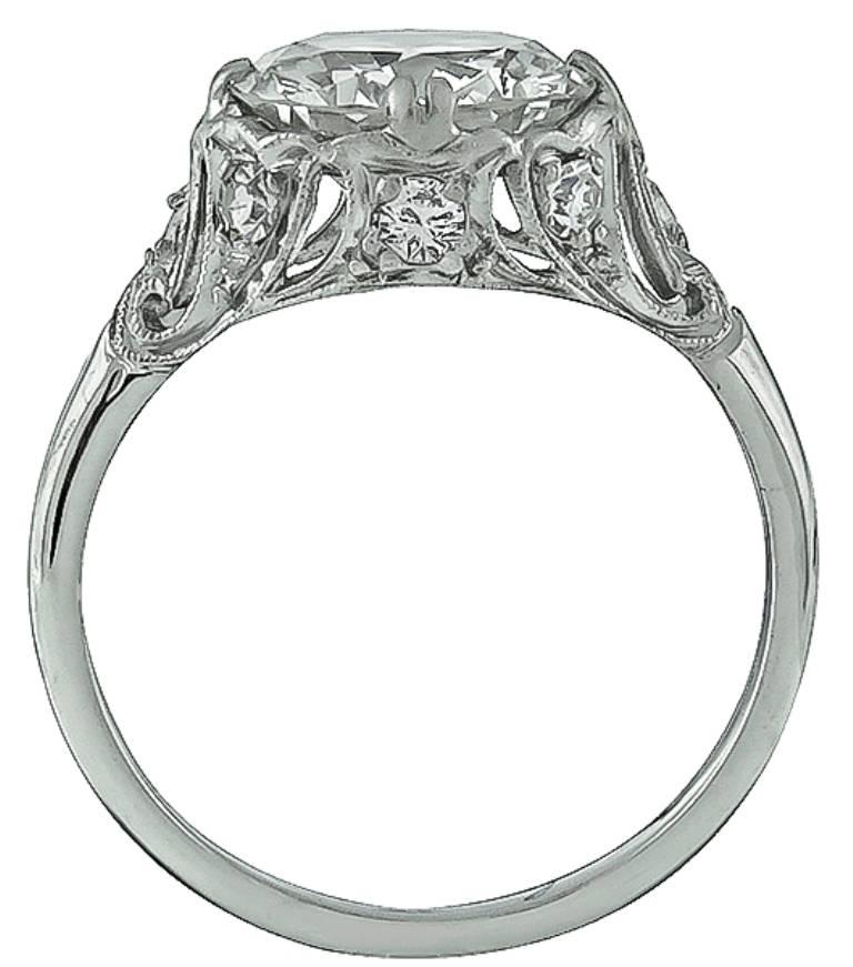 This platinum ring is centered with a sparkling GIA certified round brilliant cut diamond that weighs 2.27ct. graded I color with VS1 clarity. Accentuating the center stone are high quality diamond accents.
The ring is currently size 5 3/4, and can