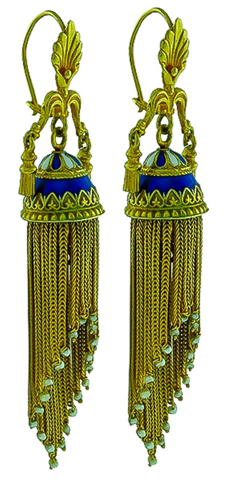 Made of 14k yellow gold, this stunning pair of earrings from the Victorian era feature a tassel motif accentuated with lovely seed pearls at the bottom.
The earrings measure 76mm by 17mm and weigh 23.8 grams.

Inventory #97279PSSS