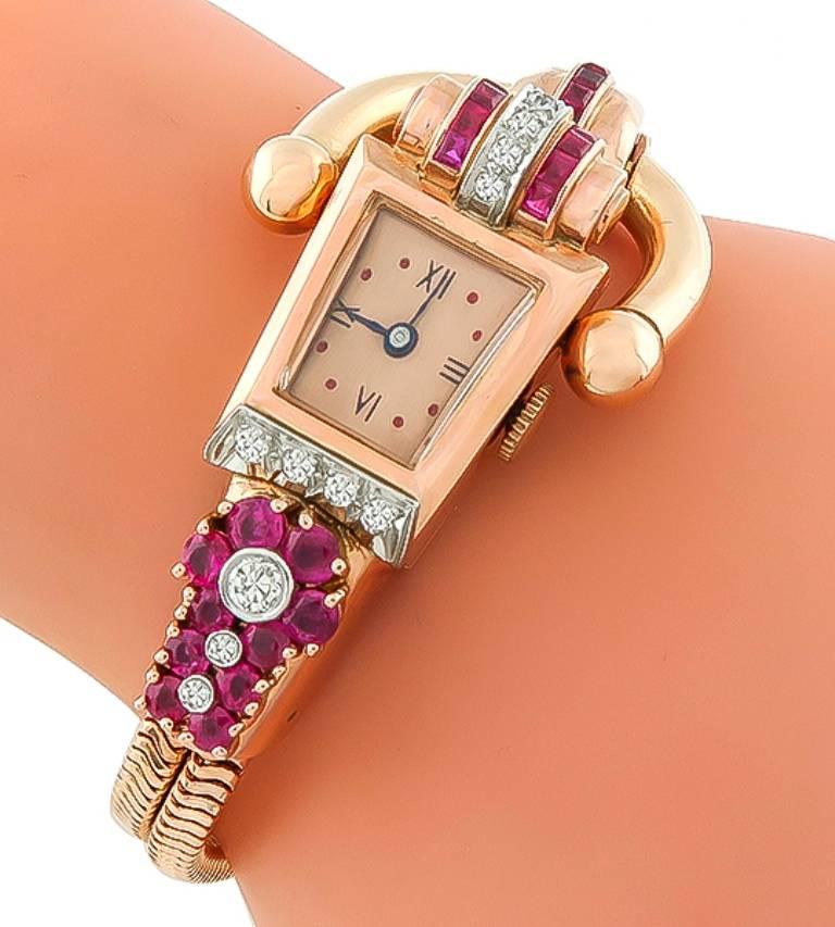 Made of 14k rose and white gold, this watch features a Swiss made movement and is set with even colored rubies and high quality diamond accents. The watch measures 7 inches in length and weighs 45.4 grams. 

Inventory #28244PPBS