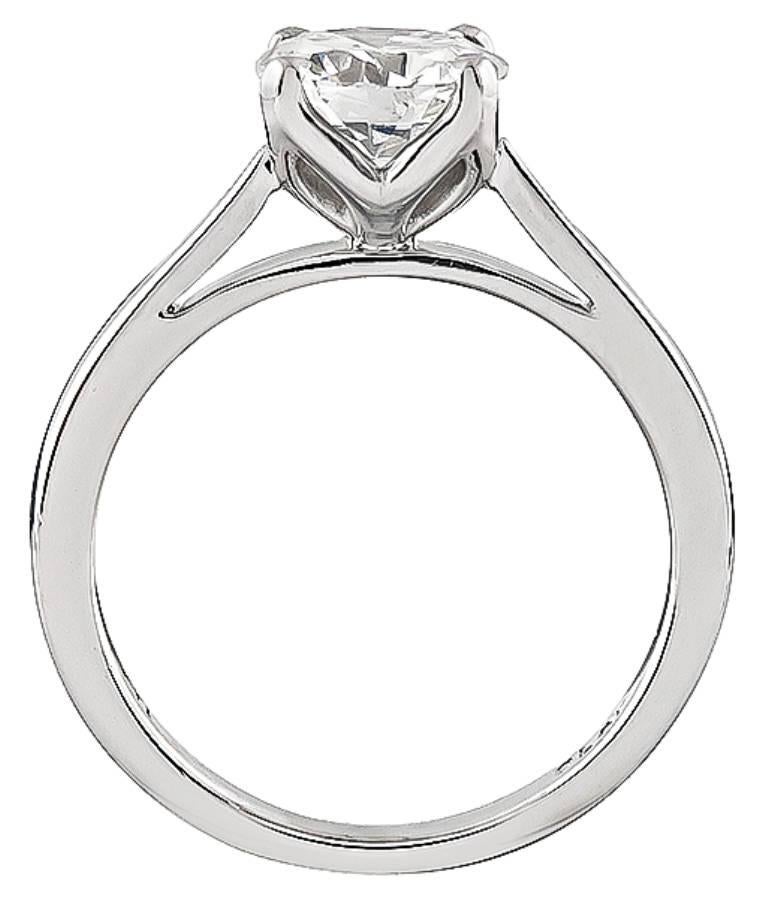This elegant platinum engagement ring is centered with a sparkling GIA certified round brilliant cut diamond that weighs 1.18ct. graded F color with Internally Flawless clarity. The ring is stamped PLAT and weighs 4.7 grams. It is currently size 5