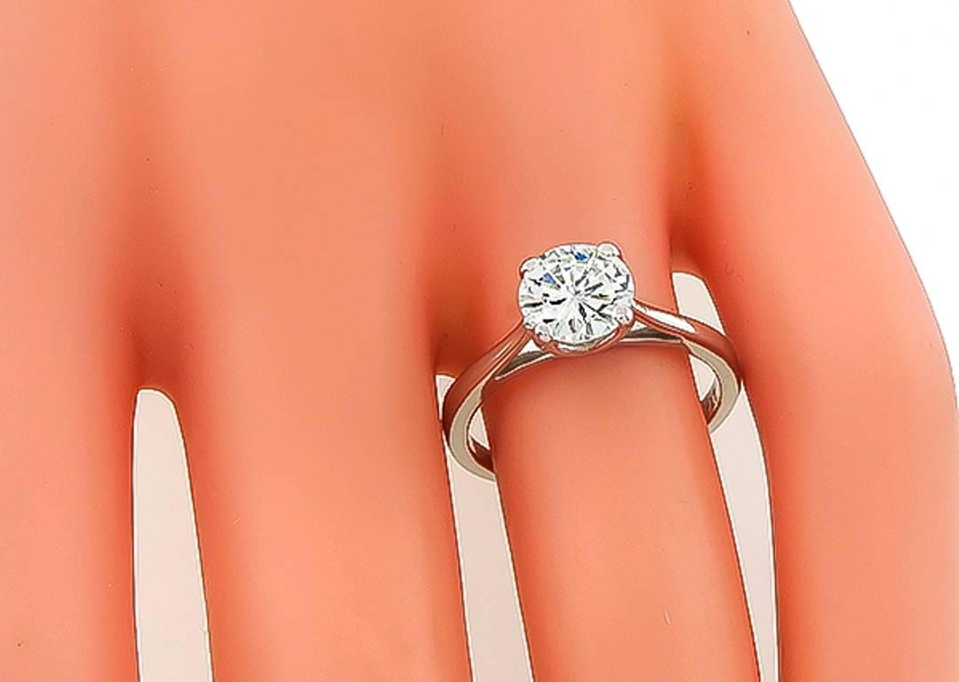Made of platinum, this ring is set with a sparkling GIA certified round brilliant cut diamond that weighs 1.06ct. graded J color with VVS2 clarity.
The ring is currently size 6, and can easily be resized. It is stamped PLAT and weighs 3.8
