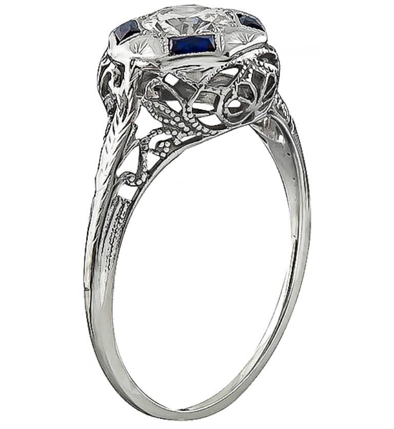 Made of 14k white gold, this ring is centered with a sparkling GIA certified old mine cut diamond that weighs 0.52ct. graded H color with VS1 clarity. The center diamond is accentuated by high quality sapphire accents.
It is currently size 7 1/2,