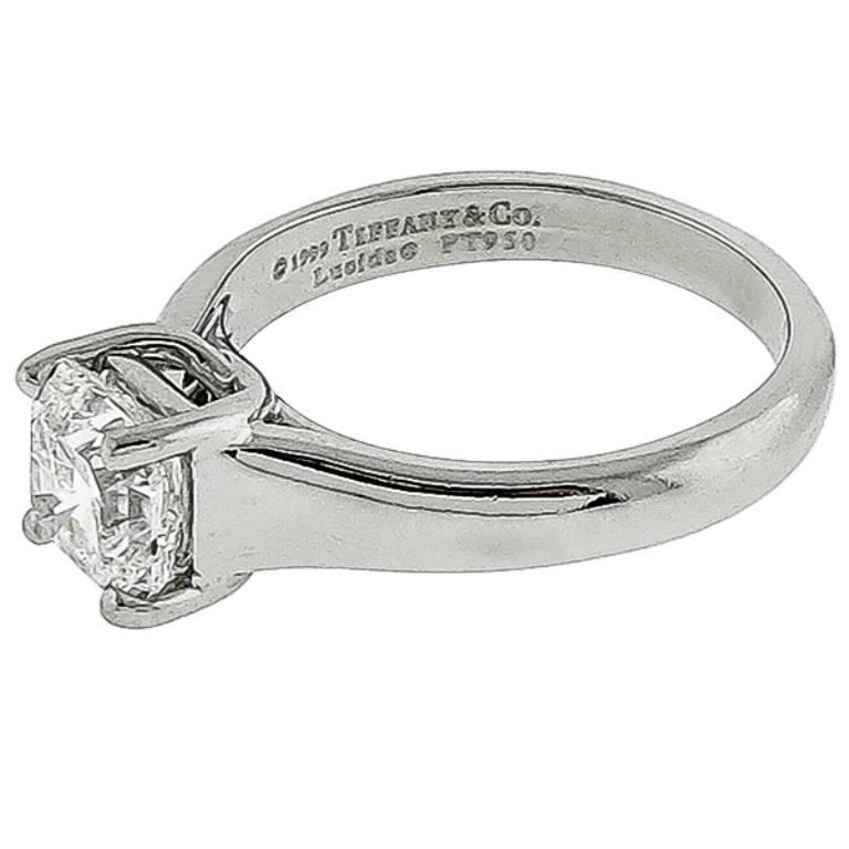 This beautiful platinum engagement ring from the Tiffany & Co. collection, is centered with a sparkling unique lucida cut diamond that weighs 1.50ct graded H color with VVS2 clarity. The ring is signed 1999 Tiffany & Co Lucida PT 950 1.50ct