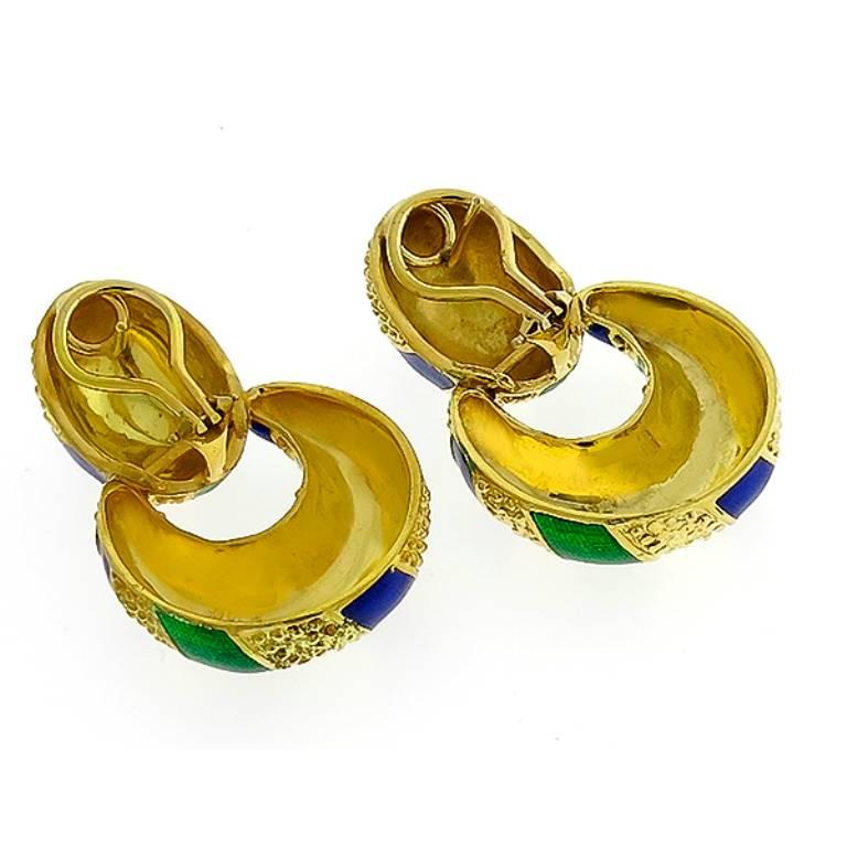 Made of 18k yellow gold, these doorknocker earrings feature blue and green enamel inlays. The earrings measure 40mm by 26mm and weighs 36.4 grams.


Inventory #18688PNSS