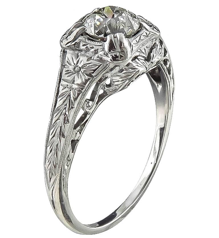 Made of 18k white gold, this ring is centered with a sparkling GIA certified old European cut diamond that weighs 0.93ct. graded K color with VS1 clarity. The ring is stamped 18K and weighs 3.3 grams.
It is currently size 8 1/4, and can easily be