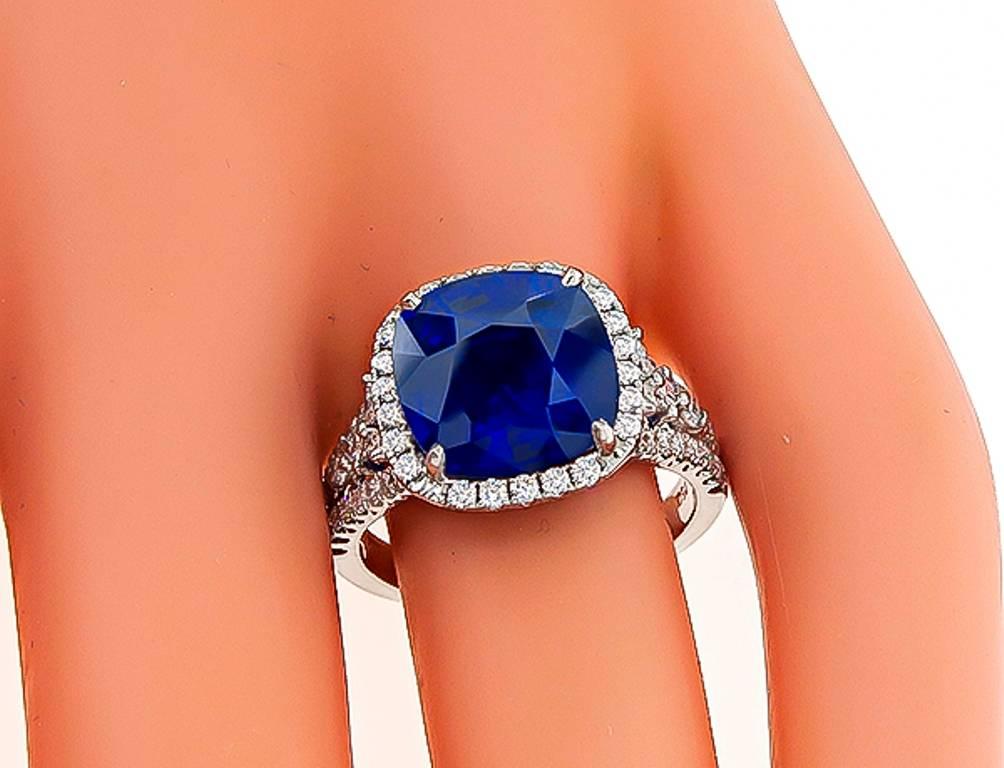Women's or Men's Enticing 6.85 Carat Sapphire Diamond Halo Ring For Sale