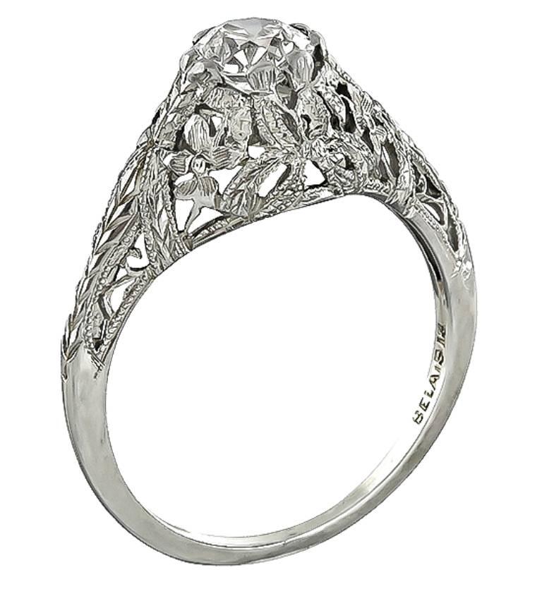 This charming 18k white gold engagement ring from the Art Deco era, is centered with a sparkling GIA certified old European cut diamond that weighs 0.51ct. graded I color with VS1 clarity. The ring is stamped BELAIS 18 and weighs 2.3 grams.
It is