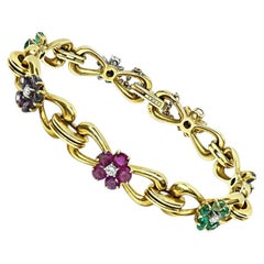 Armband aus 18-karätigem Gelbgold mit 4,50 Karat mehrfarbigen Edelsteinen und einem 0,90-Karat-Diamanten