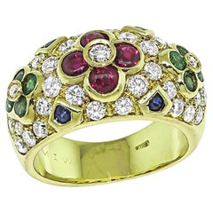 Ring aus 18-karätigem Gelbgold mit Diamanten, Rubinen, Smaragden und Saphiren (1,30 Karat)