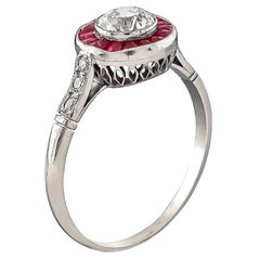 Charming 0.50 Carat Diamond Ruby Halo Ring