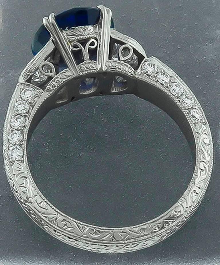 Women's 4.71 Carat Oval Cut Sapphire Diamond Platinum Ring For Sale