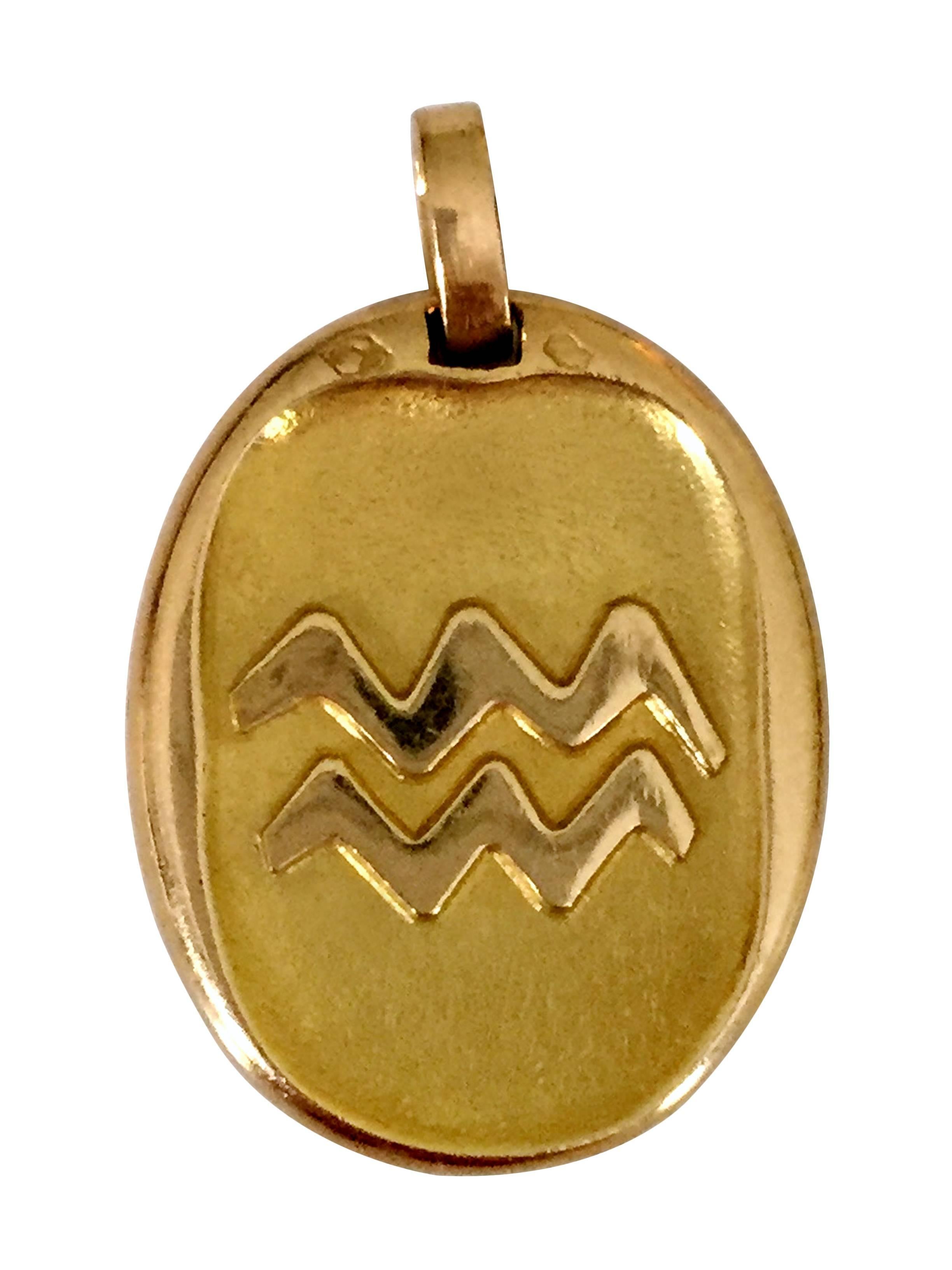 A 18 K yellow gold zodiac medal ( Aquarius)
Made in the 1960s and 1970s these rare zodiac pendant are a collector's must have.
Signed Cartier Paris and Numbered 108373

