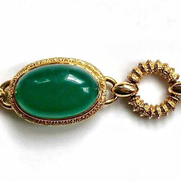 Retro Circa 1960 Van Cleef & Arpels 18 Karat Gold Green Agate Bracelet For Sale