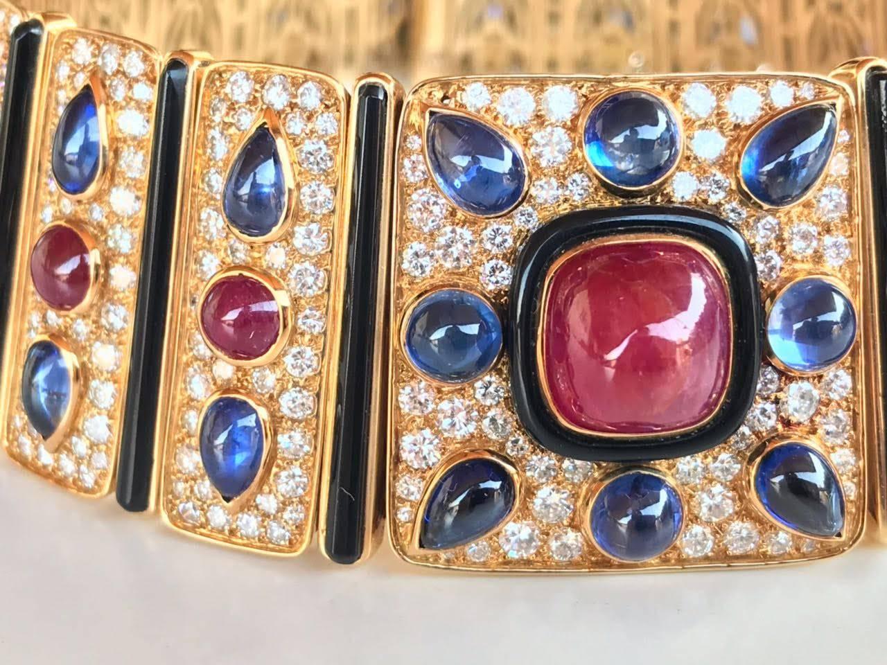 This impressive Marina B. choker is a rare and signature piece of the Italian Designer. 
Featuring a central cabochon ruby of 15 carats and additional 45 carats blue sapphire.

Marina Bvlgari, daughter of Constantino Bvlgari and granddaughter of