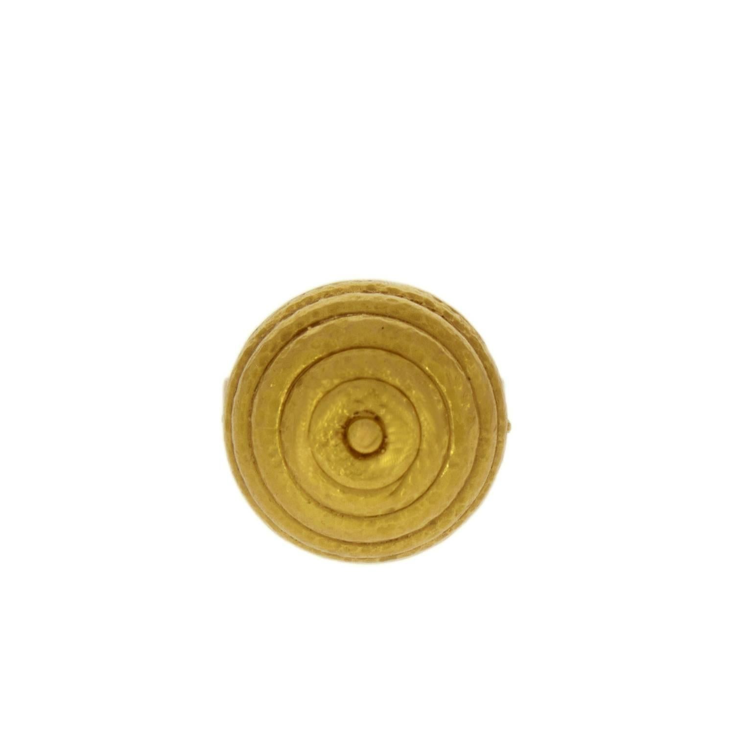 A Classical Greek dome design shield shape top  for a 22kt yellow gold ring made by Ilias Lalaounis circa 1970.  The open cuff shape shank will adjust to most ring sizes.
Gold 22K
Size: 58
Maker’s mark for Ilias Lalaounis.