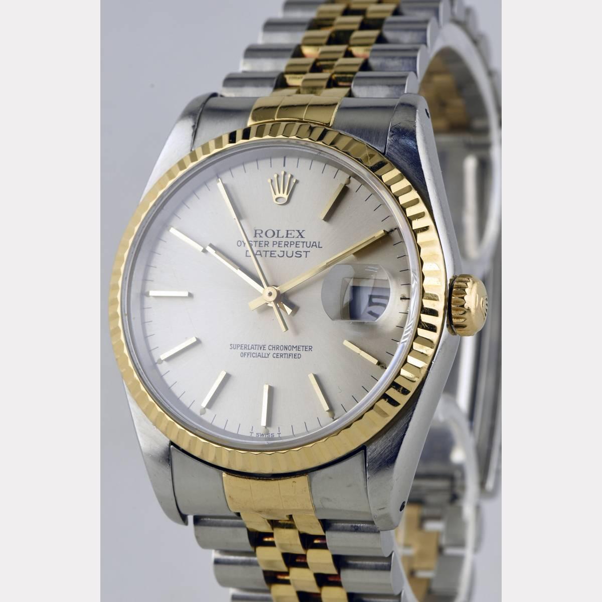 A beautiful ROLEX Datejust Men's Model, the classic with silver-colored Dial with golden hands and golden bar indices. Especially this warm combination stainless steel with gold makes the charm of this watch, it can be worn to gold or silver very