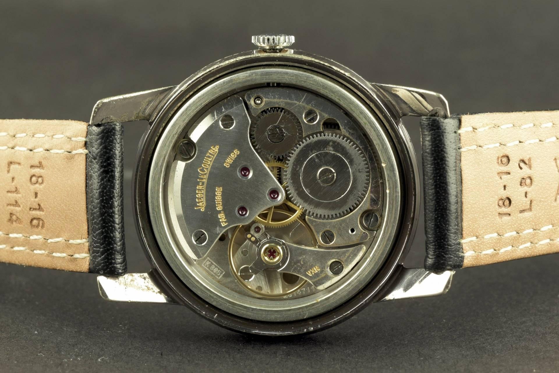 This wrist watch model by Jaeger Le Coultre is perfectly readable by the high contrast black dial and the illuminated luminous numerals. Jaeger's manufactory handwind movement here freshly overhauled keeps time very well. The watch does not have any