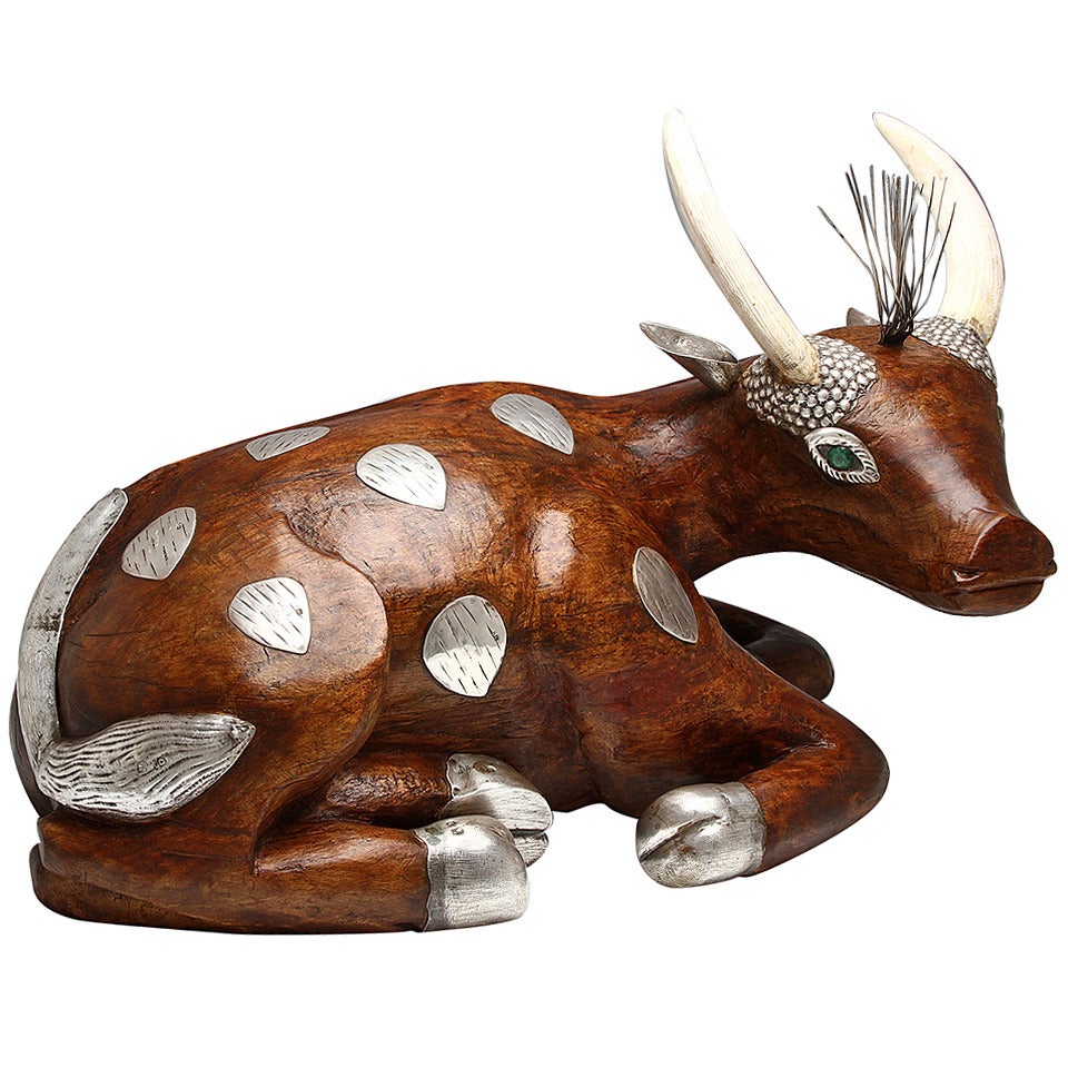 A silver and oak wood sculpture of a buffalo by Luiz Ferreira For Sale