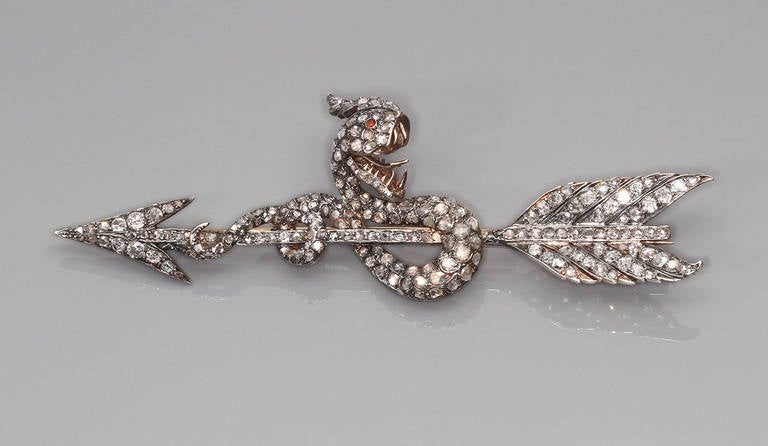 A Late 19th Century Ruby Diamond Silver Gold Snake and Arrow Brooch